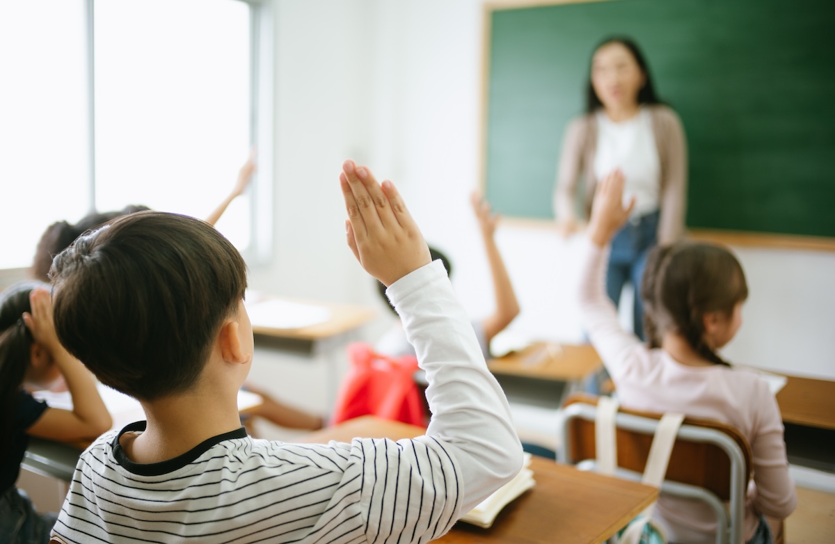 pupils-raising-their-hands-during-class-at-the-ele-2026-01-07-06-16-21-utc