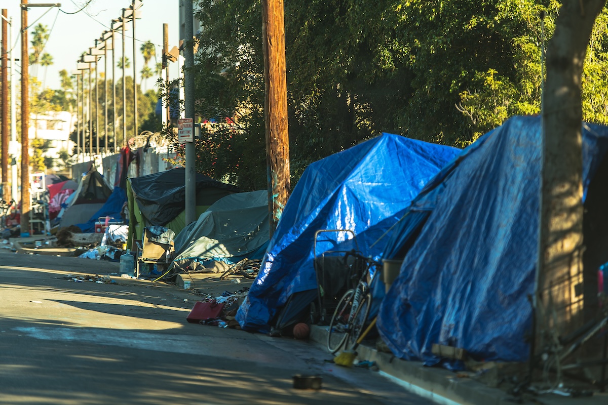 West Hollywood Homelessness Wild Tents Camp. Homeless People in the Middle of the Modern American City.